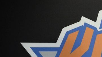 Jim Dolan (izq.) hace algunos años con Phil Jackson.