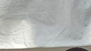 Magic Johsnon posando con la policía de Miami en el evento de salud.