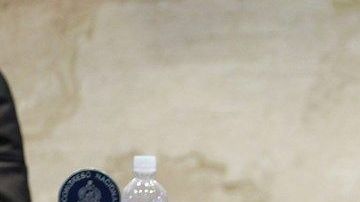 Fotografía de archivo del 10 de abril de 2013 que muestra al entonces director de la Policía Nacional, comisionado general Juan Carlos Bonilla Valladares (c), durante una comparecencia en el Parlamento, en Tegucigalpa (Honduras). La Fiscalía de Nueva York acusó este jueves de tres cargos relacionados con el narcotráfico al exjefe de la Policía Nacional de Honduras Juan Carlos Bonilla Valladares, por los que se podría enfrentar a un máximo de cadena perpetua y que además involucran al actual presidente hondureño, Juan Orlando Hernández.