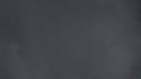 Autos de la Policía arden durante los disturbios en el oeste de L.A.