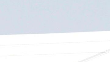 Un paciente recuperado sale en silla de ruedas del Hospital inflable de Respuesta Inmediata de Pachuca.