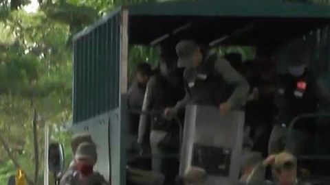 Video grab of members of Bolivarian National Guard as they are deployed outside Los Llanos prison, in Guanare, Portuguesa state, Venezuela on May 2, 2020, after a riot occured. - The death toll from a prison riot in western Venezuela has risen to at least 47, with 75 wounded, an opposition politician and prisoners' rights group said Saturday. With the coronavirus pandemic raging, visits from family and friends -- who often bring food and medicine to inmates -- have been greatly reduced. (Photo by - / AFPTV / AFP) / BEST QUALITY AVAILABLE (Photo by -/AFPTV/AFP via Getty Images)