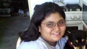 La señora Rosa junto a parte de su familia.