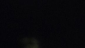 Manifestante frente a la policía en una protesta en Miami.