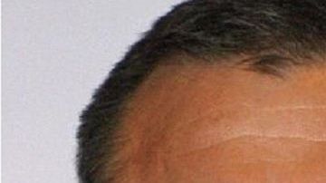 Genaro García Luna y Joaquín "El Chapo" Guzmán Loera.