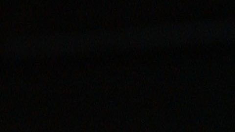 Michael Jackson con una imagen de Tommy Mottola.