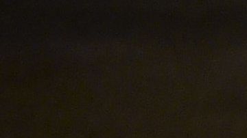 Un fan en las afueras del Camp Nou de Barcelona.