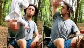 El papá agitó a su bebé frente a la cámara.