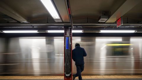 NEW YORK, NY - FEBRUARY 27: A rider waits for an arriving train at the Fulton Center subway station, February 27, 2019 in New York City. On Wednesday, the Metropolitan Transportation Authority (MTA) board voted to raise fares for New York City subway and bus riders starting in April. The board approved increases for weekly and 30-day monthly passes, but will keep the base subway and bus fares at $2.75 and eliminate the bonus MetroCard. The bonus card gave riders a 5 percent bonus for putting multiple rides on a pay-per-ride card. (Photo by Drew Angerer/Getty Images)