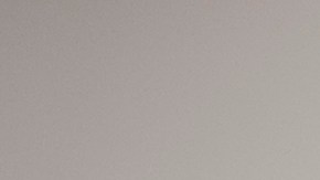 Médico realiza un examen de ultrasonido durante la visita de una mujer embarazada.