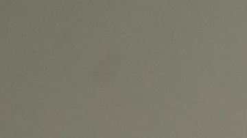 Los investigadores examinan la escena de un accidente entre una camioneta y un camión lleno de grava cerca de Holtville, California, el 2 de marzo de 2021.