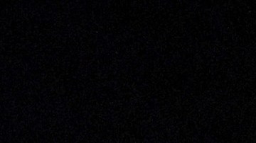 Momento del desplome de la torre Sur que queda en pie.