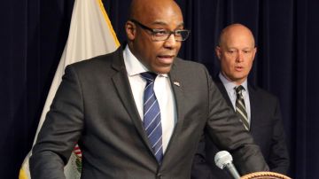 FILE - In this Feb. 11, 2019 file photo, Illinois Attorney General Kwame Raoul speaks during a news conference in Chicago. hen the coronavirus pandemic hit Illinois, state officials scrambled to buy scarce gear like protective gowns and masks and lifesaving patient ventilators. Gov. J.B. Pritzker pledged to be on the lookout for price-gouging and to report it to Attorney General Kwame Raoul. But in response to an Associated Press records request, the administration hasn't made any reports. (AP Photo/Noreen Nasir File)