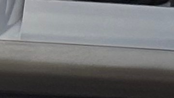 Líderes inmigrantes, entre ellos Guillermo Gómez (der) y el congresista Jesús ‘Chuy’ García (centro), dialogaron sobre las megamarchas pro inmigrantes de 2006 y la situación actual en materia de inmigración en la Academia Benito Juárez en Chicago. (Ashley Quincin / La Raza)